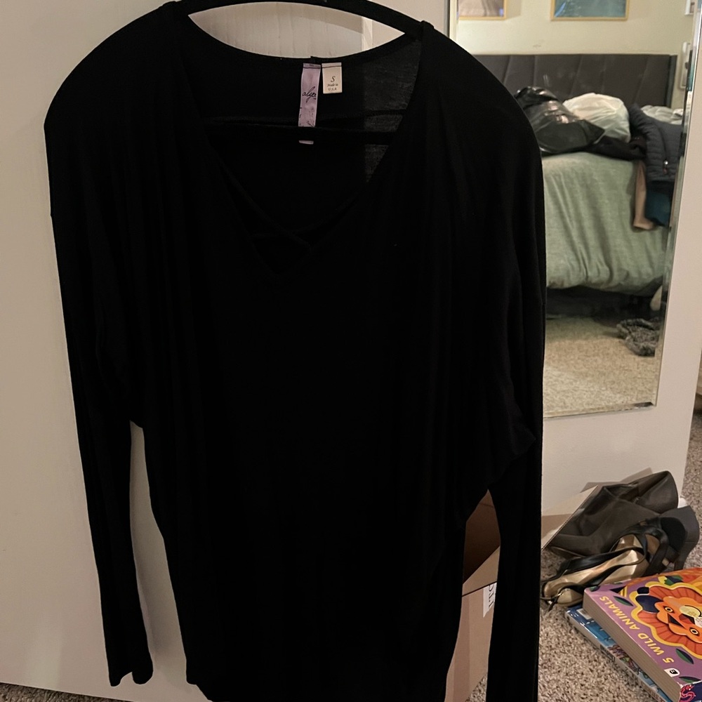 Black long sleeve tee with criss cross detail